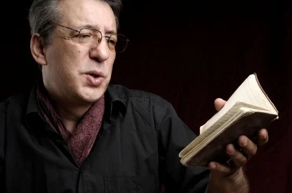 Author doing a reading of his book